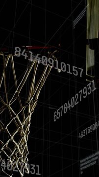 Vertical video: Basketball entering frame, net deforming and HUD data drifting for sports analytics