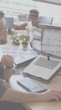 Vertical video: Dev shifting chin to mouse, creating data logs overlaying laptop chart for analysis