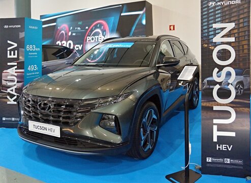 Hyundai Tucson HEV hybrid SUV on display at car showroom exhibition