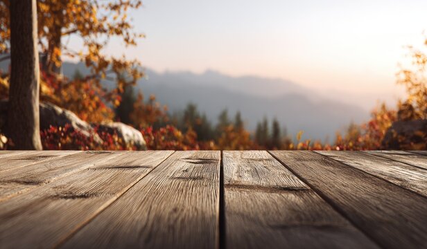 Autumnal scene with wooden foreground; mountains and fall foliage in soft, blurred background