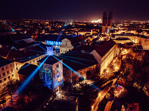 Aerial view of illuminated Lotrscak Tower and Zagreb Cathedral stand majestically amidst the city's vibrant nightscape, Zagreb, Croatia.
