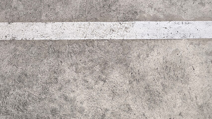Fototapeta premium Concrete floor with white line, minimal urban background with copy space