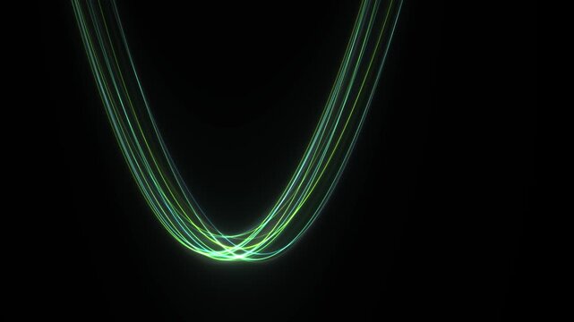 Green And Blue Light Streaks Forming A U Shape Over Black Background