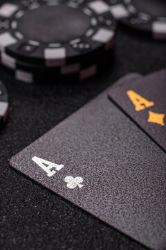 Playing cards and chips on a table, a gambling game of blackjack or baccarat. Cards and chips