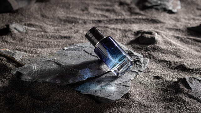 Sophisticated blue perfume in environment rocks and volcanic sand.