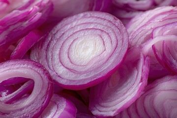 Fototapeta premium Freshly sliced red onions in heap.