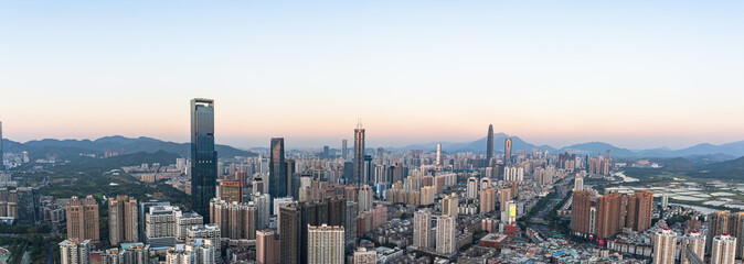 Fototapeta premium The skyline of Futian District, Shenzhen at dusk