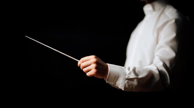 Bandmaster of the orchestra with two batons