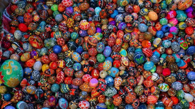 Pysankas backdrop of numerous colorful eggs. Ukrainian art of egg-decoration for Easter.