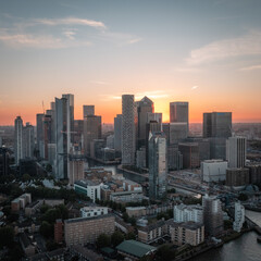 Fototapeta premium Sunset Aerial Canary Wharf skyline - modern London financial district 