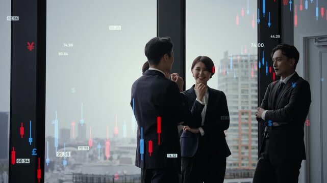 オフィスで会話するビジネスパーソンのグループと金融テクノロジーのコンセプトイメージ