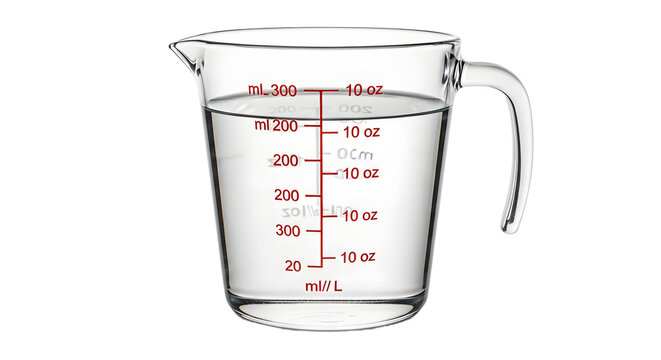A clear glass measuring cup filled with water on a black background