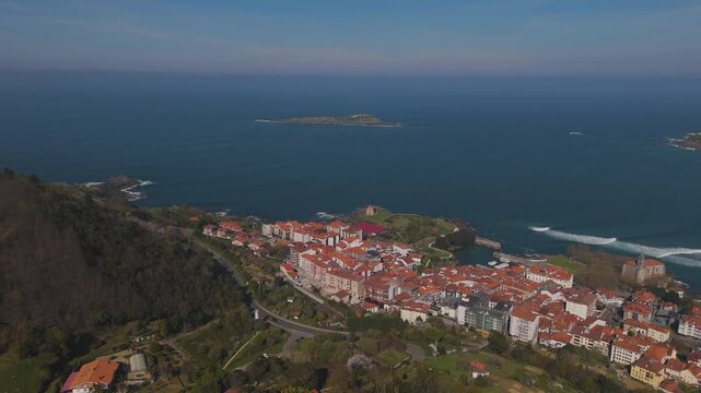 Drone flight around Mundaka on a sunny day near the end of Winter
