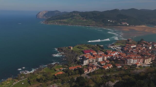 Drone flight around Mundaka on a sunny day near the end of Winter