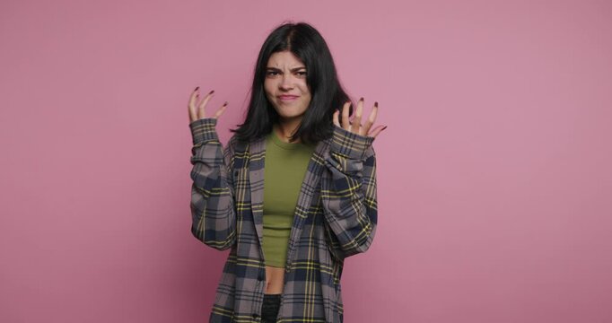 Expressive emotions capture in playful poses against a vibrant pink backdrop