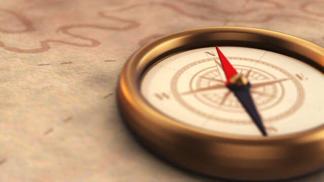 Defocused Vintage Compass Pointing North on Old Map with Copyspace