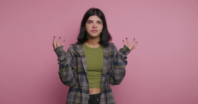 Expressing emotions through unique gestures and vivid facial expressions in a bright studio setting
