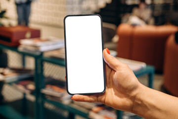 Mockup woman's hand holding using smart phone with white blank screen POV , mobile app design and...
