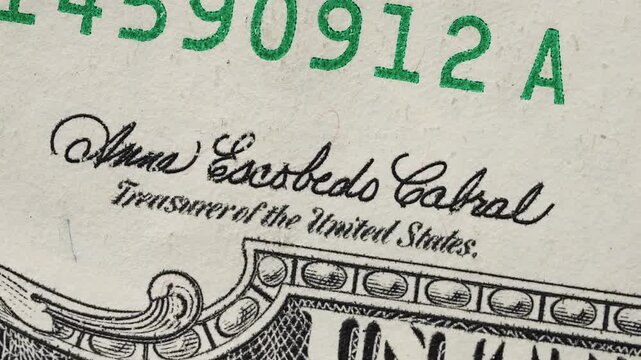 Macro video euro and US dollar bills security printing details. Close up symbols holograms serial numbers currency design. International money finance banking investment trade logistics concept.