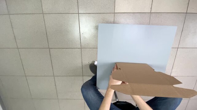 Self-assembly box. Cardboard box. Slow motion video. High quality 4k footage