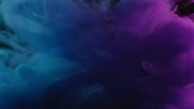 Vibrant blue and purple smoke swirls create a dynamic abstract background, offering an energetic and fluid visual texture. Perfect for modern creative designs and digital art