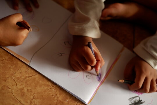 closeup colaboration chilldren hands make art education theme