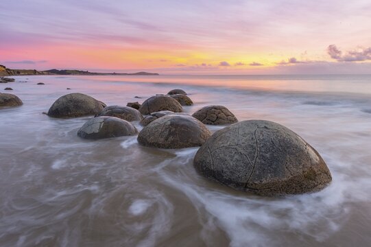 Moeraki boulders, at sunrise, geological formation, Koekohe Beach, Moeraki, East Coast, Otago, South Island, New Zealand