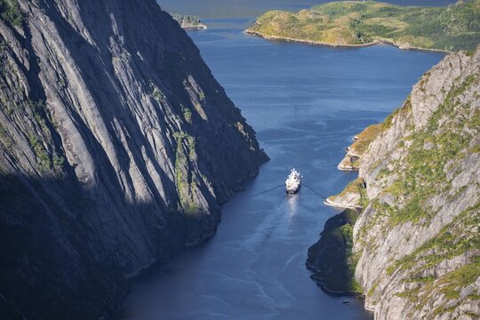 Mountains and sea, Hurtigruten boat in fjord Trollfjord and Raftsund, Lofoten, Nordland, Norway