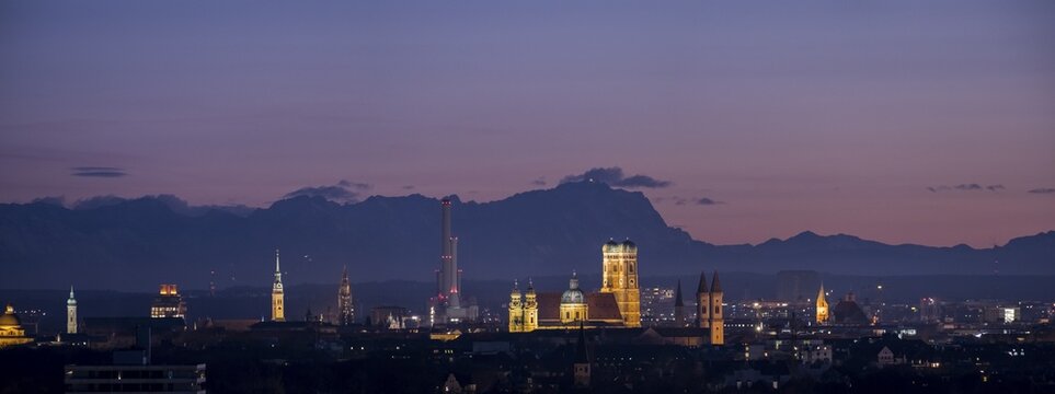 Panorama, view over Munich with Church of Our Lady, Theatine Church, Ludwigskirche, in the back Zugspitze at evening mood, Munich, Upper Bavaria, Bavaria, Germany