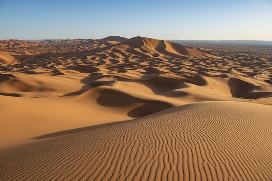 Sand dunes in the desert, wave patterns in the sand, dune landscape Erg Chebbi, Merzouga, Sahara, Morocco