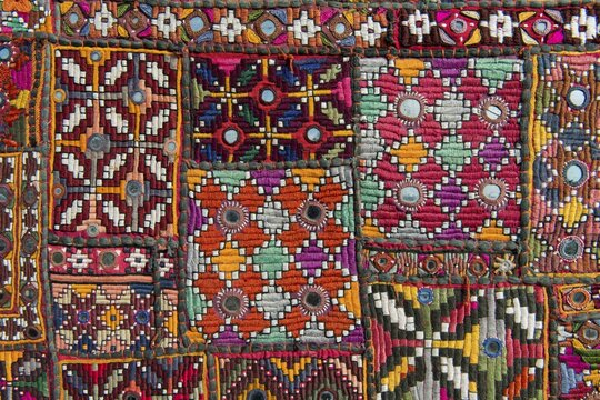 Traditional wall hanging from Rajasthan, colourful, inlaid with mirrors and different patterns, detail, Udaipur, Rajasthan, India