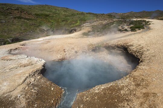 Steaming thermal spring, thermal area Reykjadalur near Hveragerdi, South Iceland, Iceland