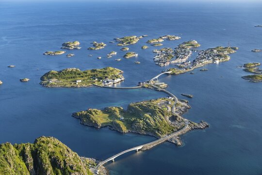 View of fishing village Henningsvaer from the top of Festv&aring;gtinden, Small islands connected by road and bridges, Austv&aring;g&oslash;ya, Lofoten, Norway