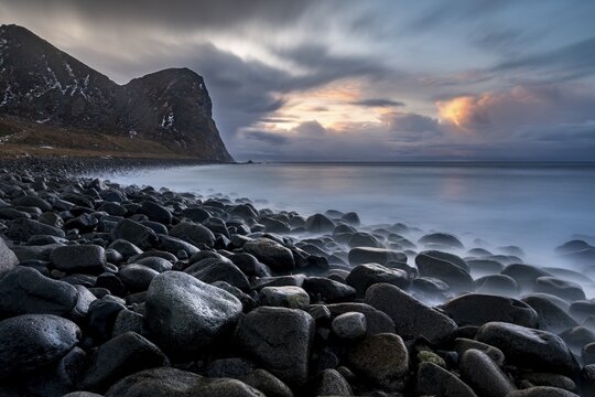 Rocky coast with surf, Unstad Beach, Lofoten, Norway
