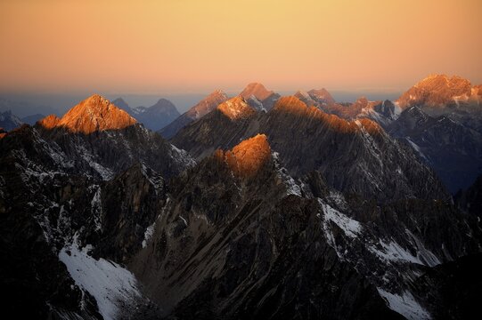 Sunlight shining on Alpine peaks at sunrise, Gramais, Lechtal, Reutte, Tirol, Austria, Europe