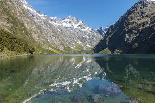 Reflection in Lake Marian, Fiordland National Park, Te Anau, Southland, South Island, New Zealand