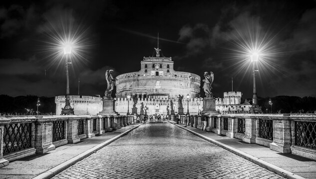 Mausoleum of Hadrian or Castel Sant'Angelo and Ponte Sant'Angelo at night, Rome, Lazio, Italy