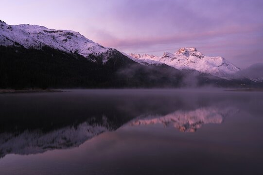 Early morning on Lake Silvaplana, Mt Piz da la Margna at back, St. Moritz, Engadine, Grisons, Switzerland, Europe
