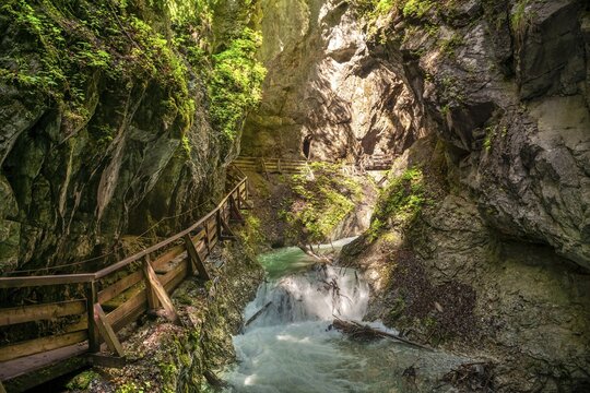 Path along a rock face, mountain stream flowing through a narrow gorge, gorge with river, Wolfsklamm, Stans, Tyrol, Austria