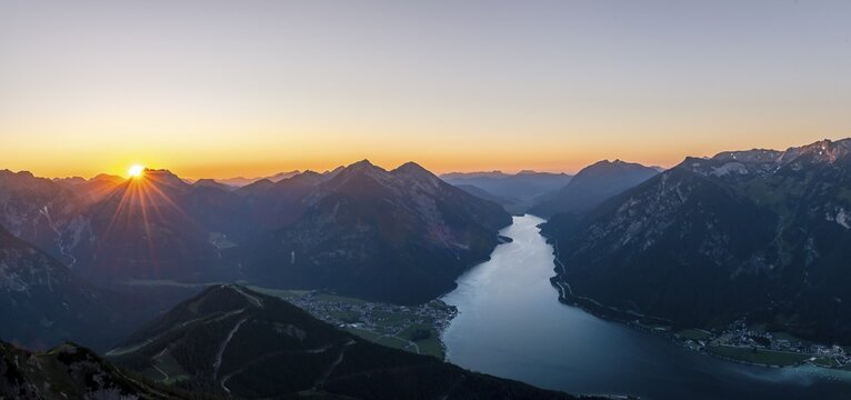 Last rays of sun over mountain landscape at sunset, view from summit of B&auml;renkopf to Achensee and summits Seebergspitze and Seekarspitze, panorama, Tyrol, Austria
