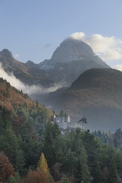 Castle ruins and Mt Mangart, 2677m, Predil Pass, Triglav National Park, Slovenia, Europe