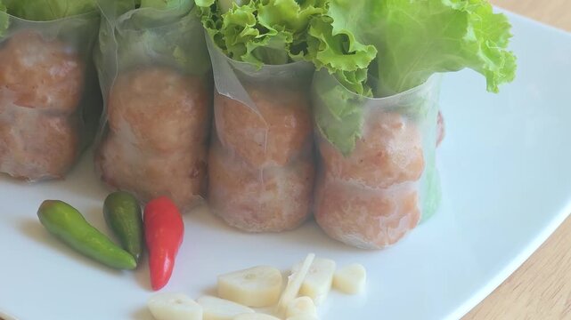 Nem Nuong (Vietnamese grilled pork sausage), rice paper wrappers pork.