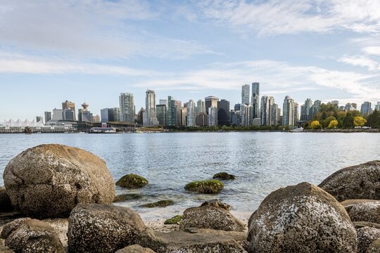 Skyscrapers, skyline of Vancouver reflected in the sea, Coal Harbour, Downton Vancouver, British Columbia, Canada