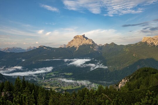 View of the valley with the village of San Vito di Cadore and the peak of Monte Pelmo, ascent to Forcella Grande, Sorapiss circuit, Dolomites, Belluno, Italy