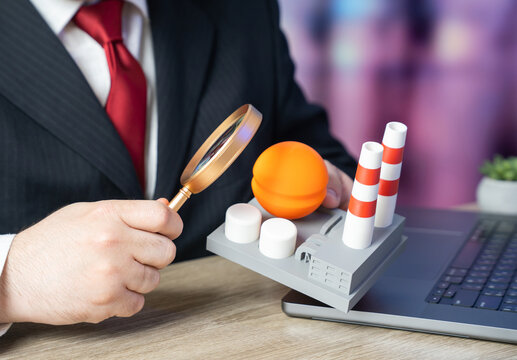 A businessman studies an industrial plant analyzing assets and processes. Sector evaluation and performance. Investment insight, production analysis, and economic assessment guide strategic decisions