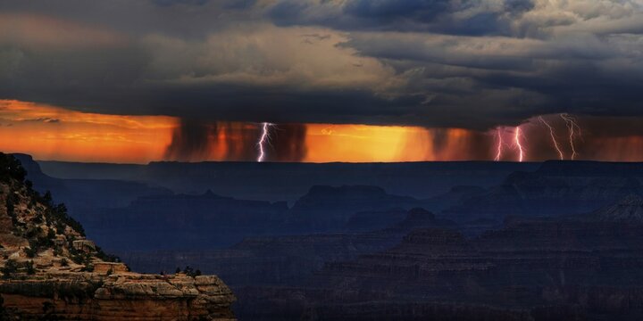 Panorama, Dark thunderclouds with lightning over Grand Canyon at sunset, in front viewpoint Mather Point, South Rim, Grand Canyon, near Tusayan, Arizona, USA, North America