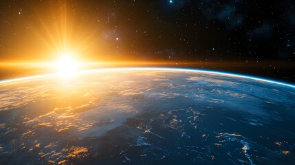 Fototapeta premium Sunrise over planet Earth in space image