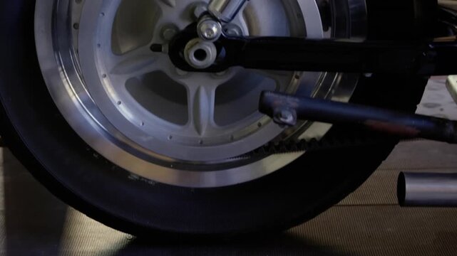 Animation of close up of wheel of motorbike