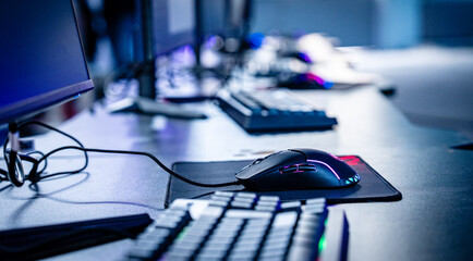 Professional esports setup: a dedicated computer station with high-performance gaming peripherals ready for a tournament.