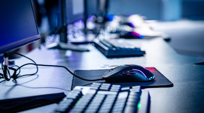 Professional esports setup: a dedicated computer station with high-performance gaming peripherals ready for a tournament.